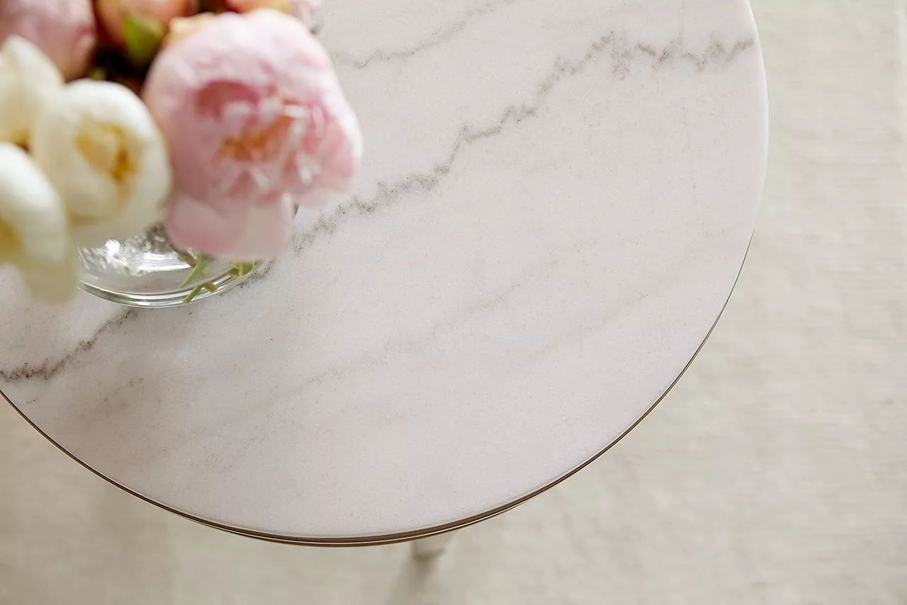 The Amani chairside table showing the marble top in room scene.